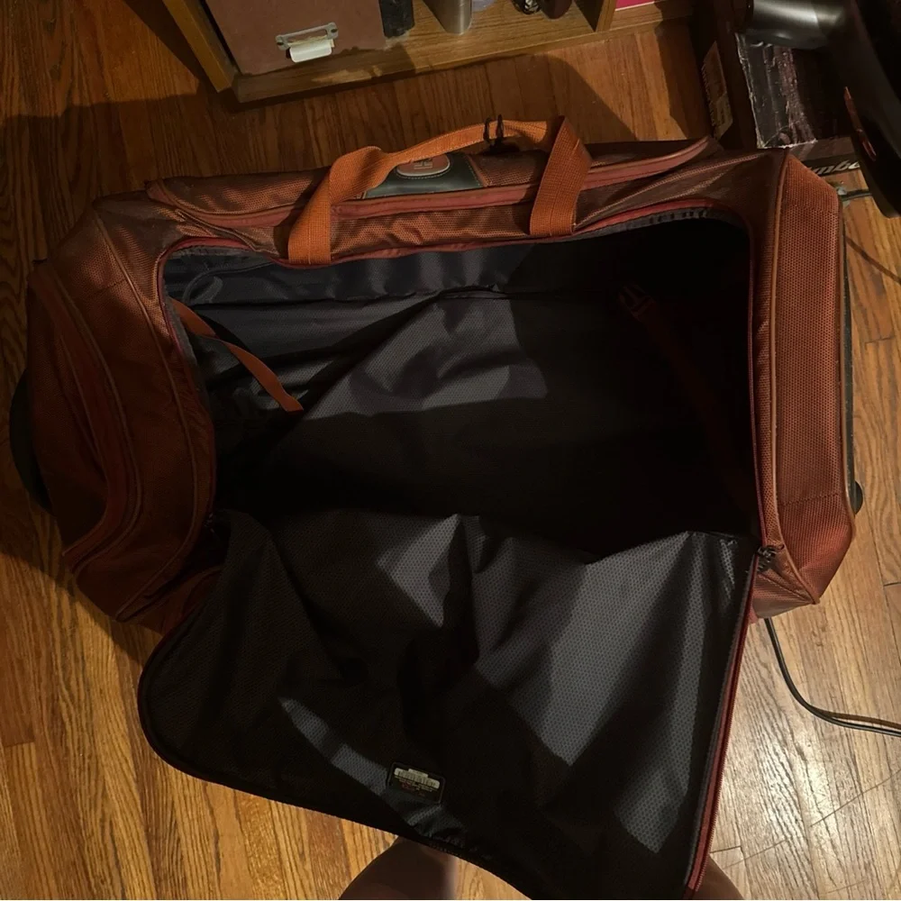 Tumi Rolling Garment Bag in Burnt Orange